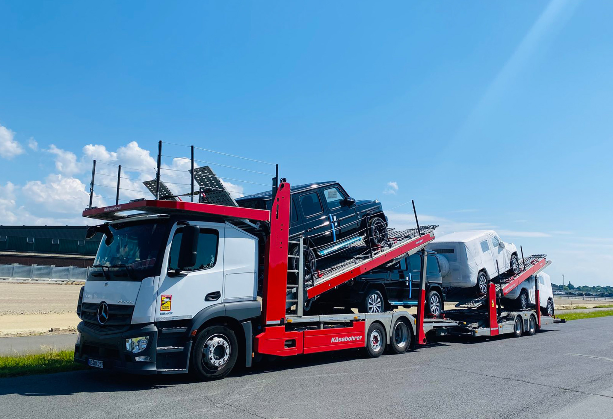 A loaded car transporter carrying vehicles to the port